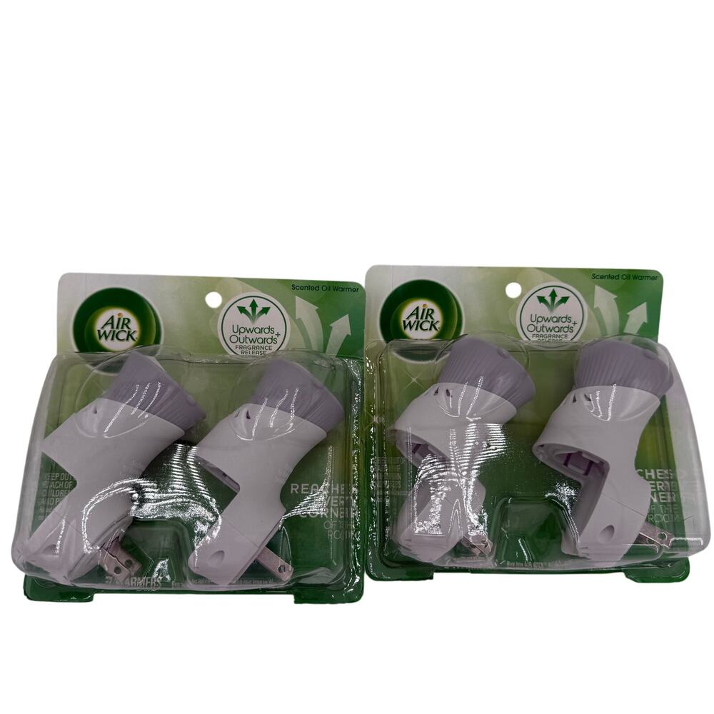 Air Wick Plug In Scented Oil Warmers NEW Set of 4